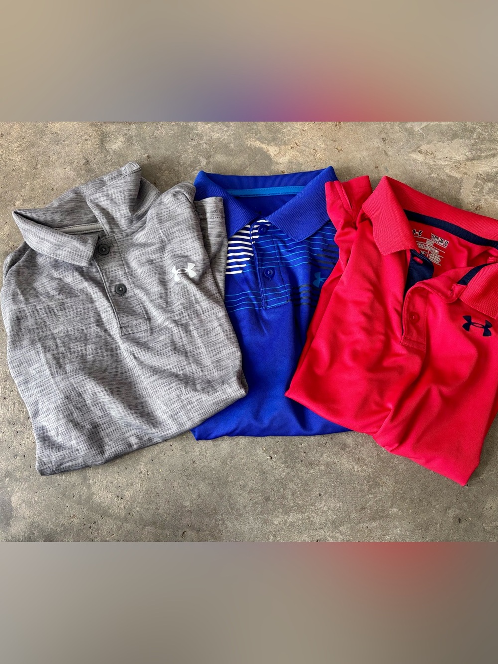 Lot of three Under Armour Kids Performabce Polos- Gray, Blue & Red